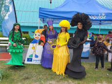 ladies in costumes representing the four elements