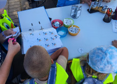 production of badges for children with the populair logo