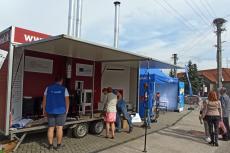 trailer with wood-burning appliances, heating demonstrations