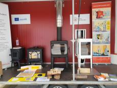 trailer with wood-burning appliances, heating demonstrations