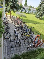 The mass of bicycles on the school grounds that children use to travel to and from school