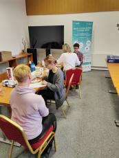 People working at the info point