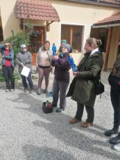 Group of people listening to presenter