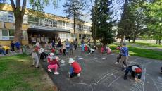 Kids drawing on the pavement
