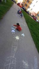 Detail o a child drawing on pavement